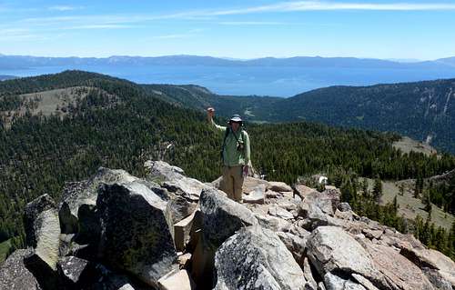 Jordan celebrating reaching the summit Twin Peaks.  Lake Tahoe behind