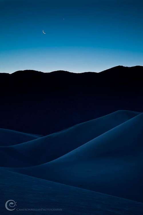 The Moon and Jupiter Rise Over the Dunes