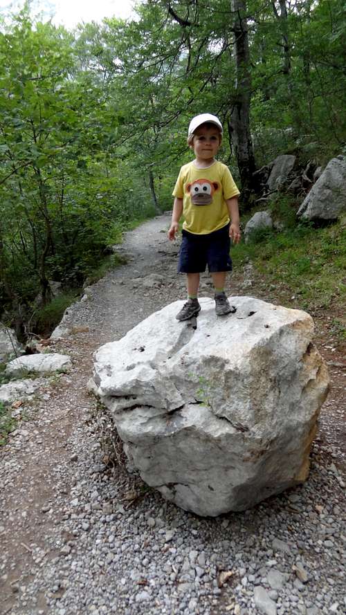 Mikolaj on a rock on the Paklenica trail