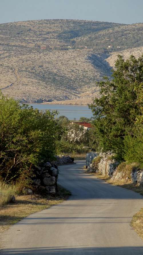 The road leading to Mala Paklenica in early sunrise, looking down to the sea. A mediterranean dream.