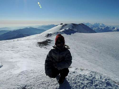yunona Bukasova on Elbrus, 5642 m with East Summit on background