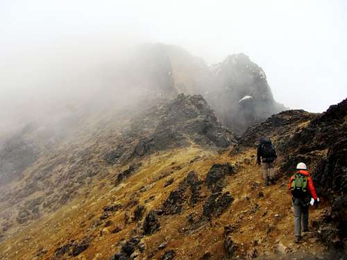heading up the ridge on Illinizas Norte