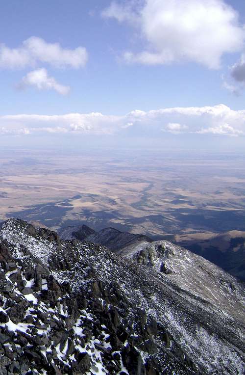 Looking down towards the plains from the summit of Crazy Peak