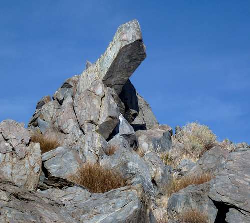 Finger-like rock below the summit