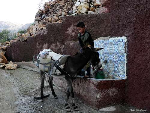 A Berber kid taking on water near Imrir