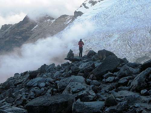 Mark looking at the glacier next to Chopicalqui moraine camp