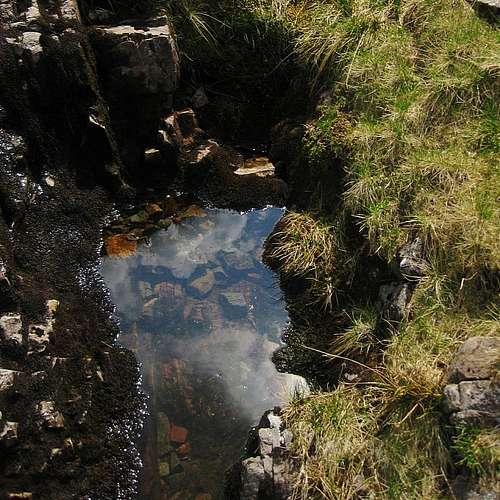 A tiny puddle high in the Grains Gill