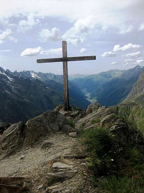 Gahwinden summit cross (2649m) and the Pitztal valley, more than a thousand meters below