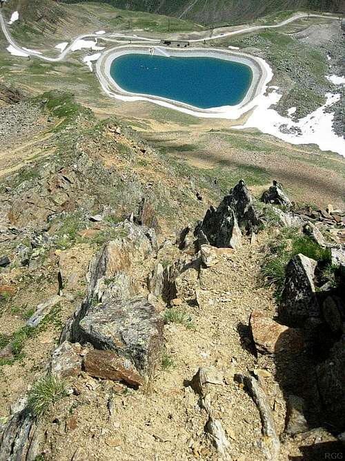 Looking down at the small lake next to the Rotkogeljochhütte from the Rotkogel east ridge