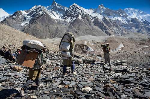 A Sirdar watches over Porters