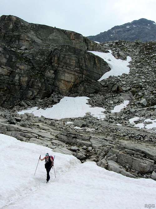 Jannie crossing a snow field, high up in the Ochsental