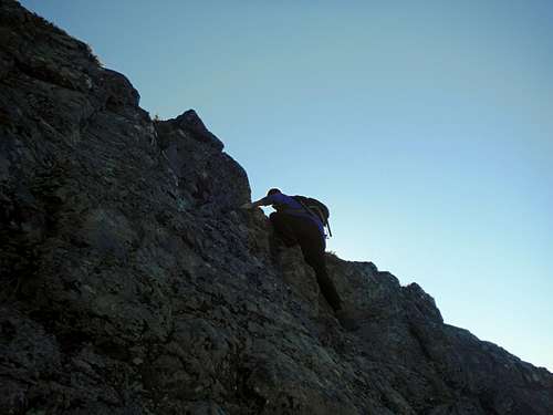 JordanH scrambling up the rock