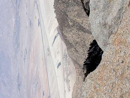 The desert floor below
