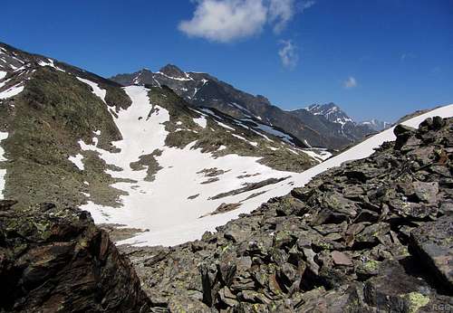 Looking down on the Ginggljoch from low on the Gfallwand WNW ridge - with Roteck (3337m) behind