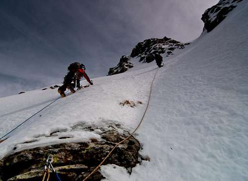 Parties climbing the White Gully (Canale Bianco) on Torricella