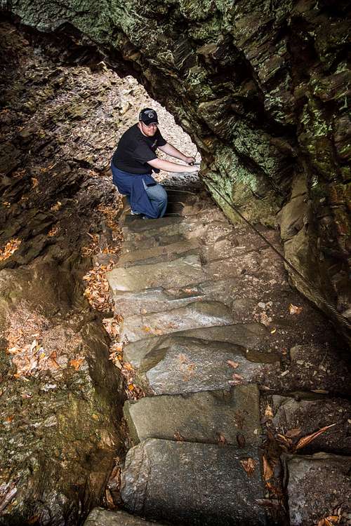 Steep curving wet steps inside Arch Rock