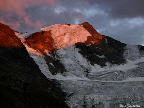 Punta Cadini at sunset seen from Rifugio Branca