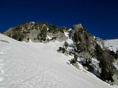 The steep snowy buttress which connects to the main plateau of Disappointment Peak, Teton Range
