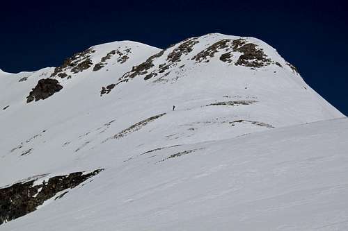 Skier below the summit of Trico Peak