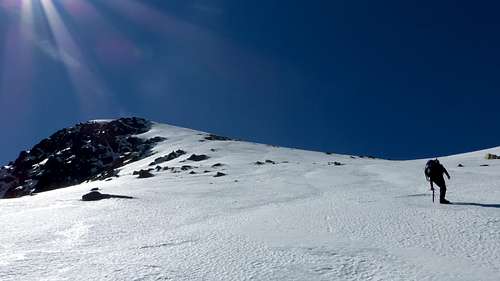 Climbing the ice slopes of Covacha north face 