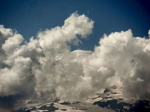 The summit of Tahoma through the clouds