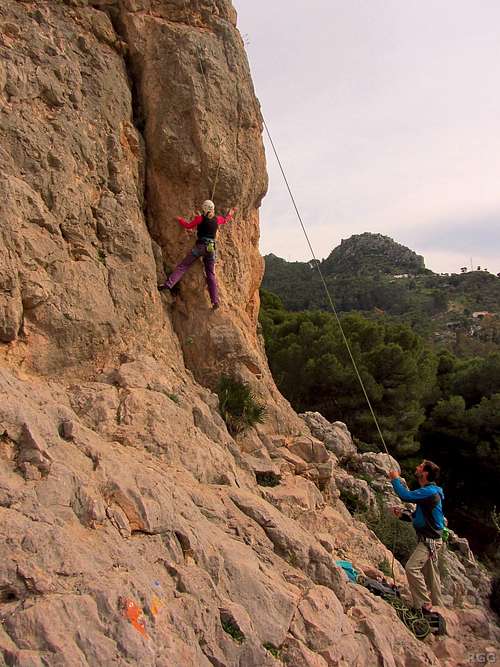 Climbers on <i>Baron Rojo</i> at Frontales, sector Castrojo