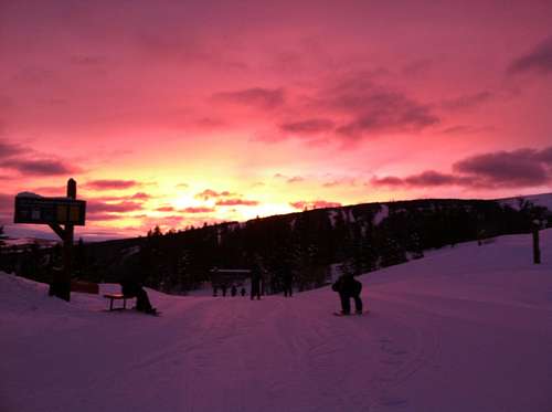 Strapping in to go to work at sunrise, Beaver Creek, Colorado