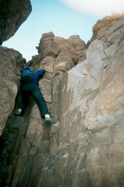 John Paterson climbing on the...