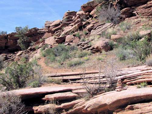 The cairns show the route up the slope