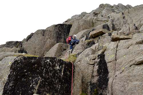 Climbing summit rocks of Pen