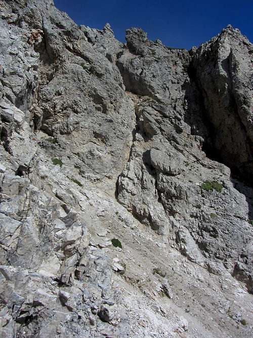 An exposed but secured section of the Günther Messner Steig - zoom in, and you can see the cable