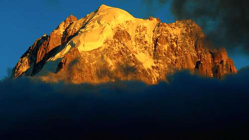 Cloudy Aiguille Verte at sunset