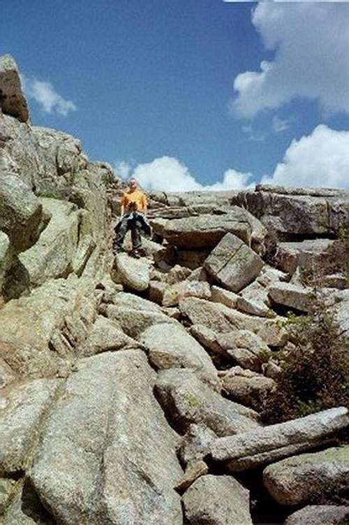 A steep rocky downclimb from...