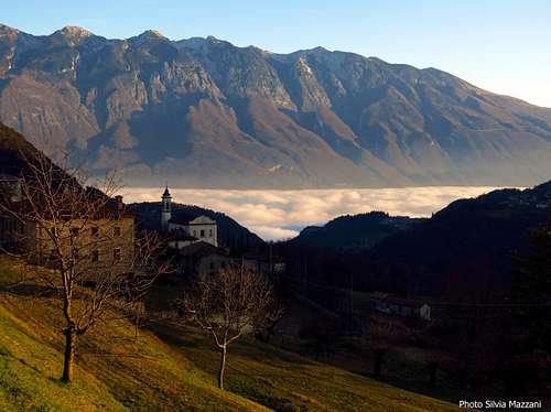 Monte Baldo and Garda Lake within the clouds