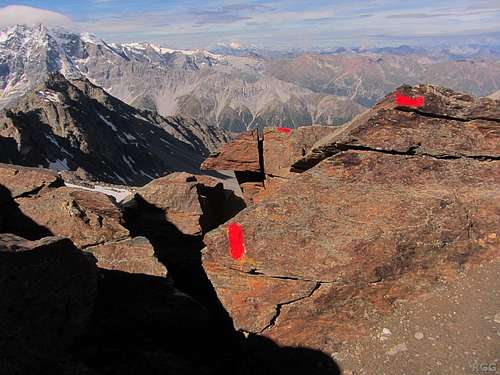 Fresh paint marks the normal route high on the Tschenglser Hochwand