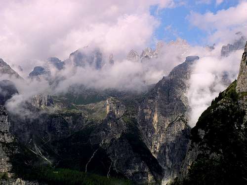 Brenta central sector emerging from clouds seen from the trail to Lasteri