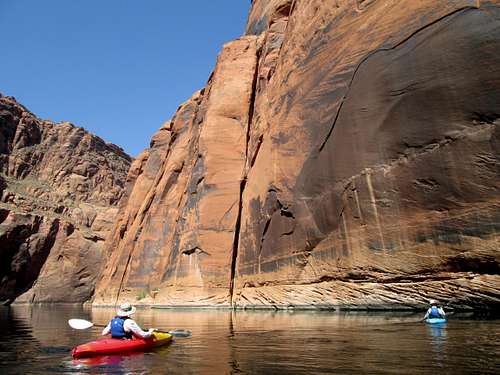 Kayaking beneath a beautiful crack in the walls of Lower Glen Canyon