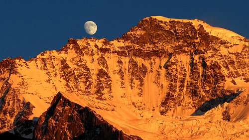 Moon rises up over Jungfrau west ridge