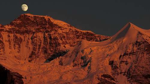 Moon rises up over Jungfrau west ridge 16