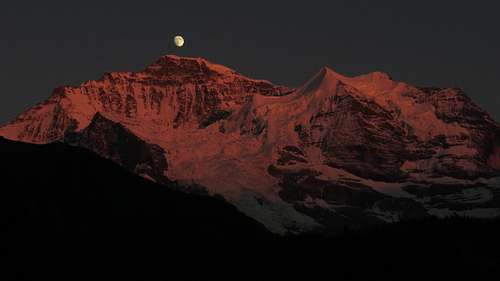 Moon rises up over Jungfrau west ridge 21