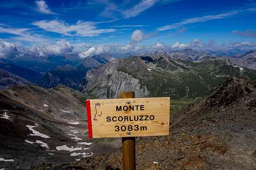 Scorluzzo Summit sign