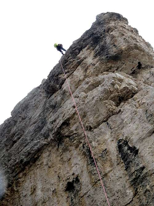 Jan rappelling from Torre Lusy