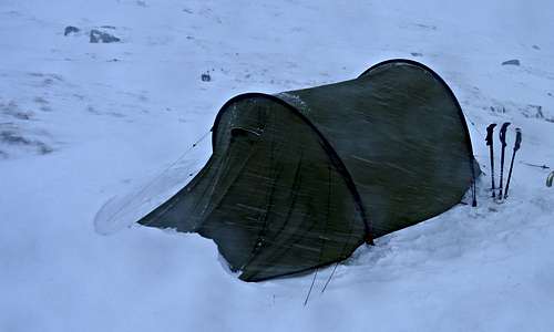 Storm battered tent in upper Coire Leachavie at 820m