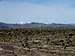 Zoomed view of Quicksilver & Hayden Peaks 31 miles away