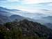 Twin Peaks Southeasterly ridge view down to Triplet Rocks