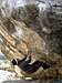 Larissa on a Steep Boulder Problem