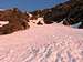 First sun rays paint snow of Dead Dog Couloir red