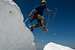 Jumping the Bergschrund just below the summit on Mt. Challenger