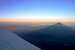 Shadow of Pico de Orizaba at sunrise, with a glance of Popocatépetl and Iztaccíhuatl at the horizon