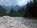 The capricous Bela Voda river carries masses of white granite peebles and boulders after every flooding